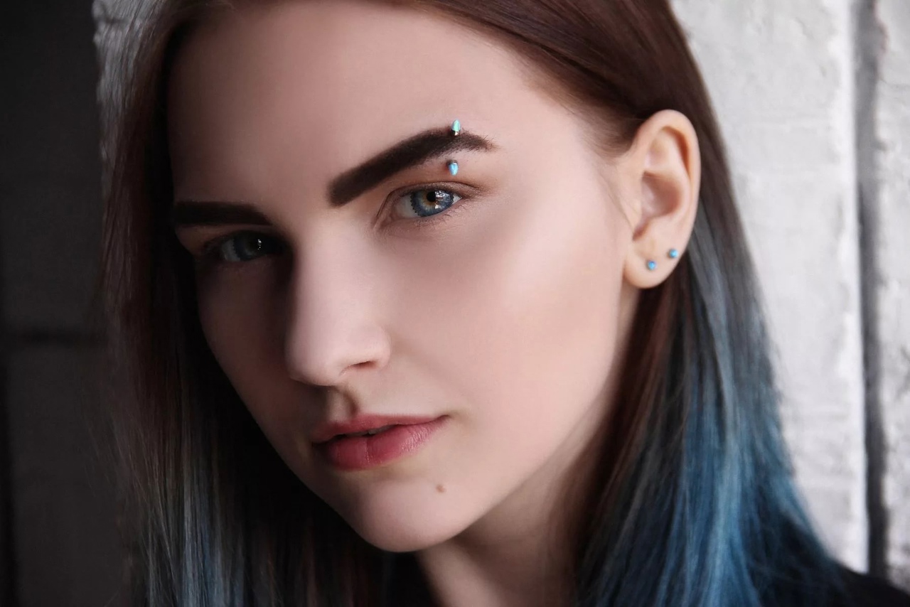 Handsome girl with Eyebrow Piercing